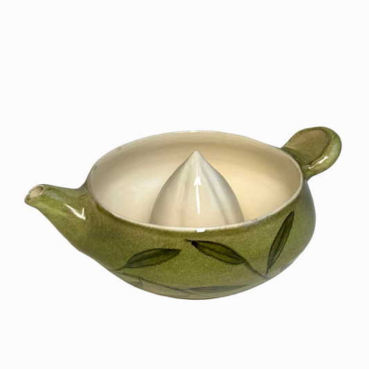 Hand Carved Fruit Juicer